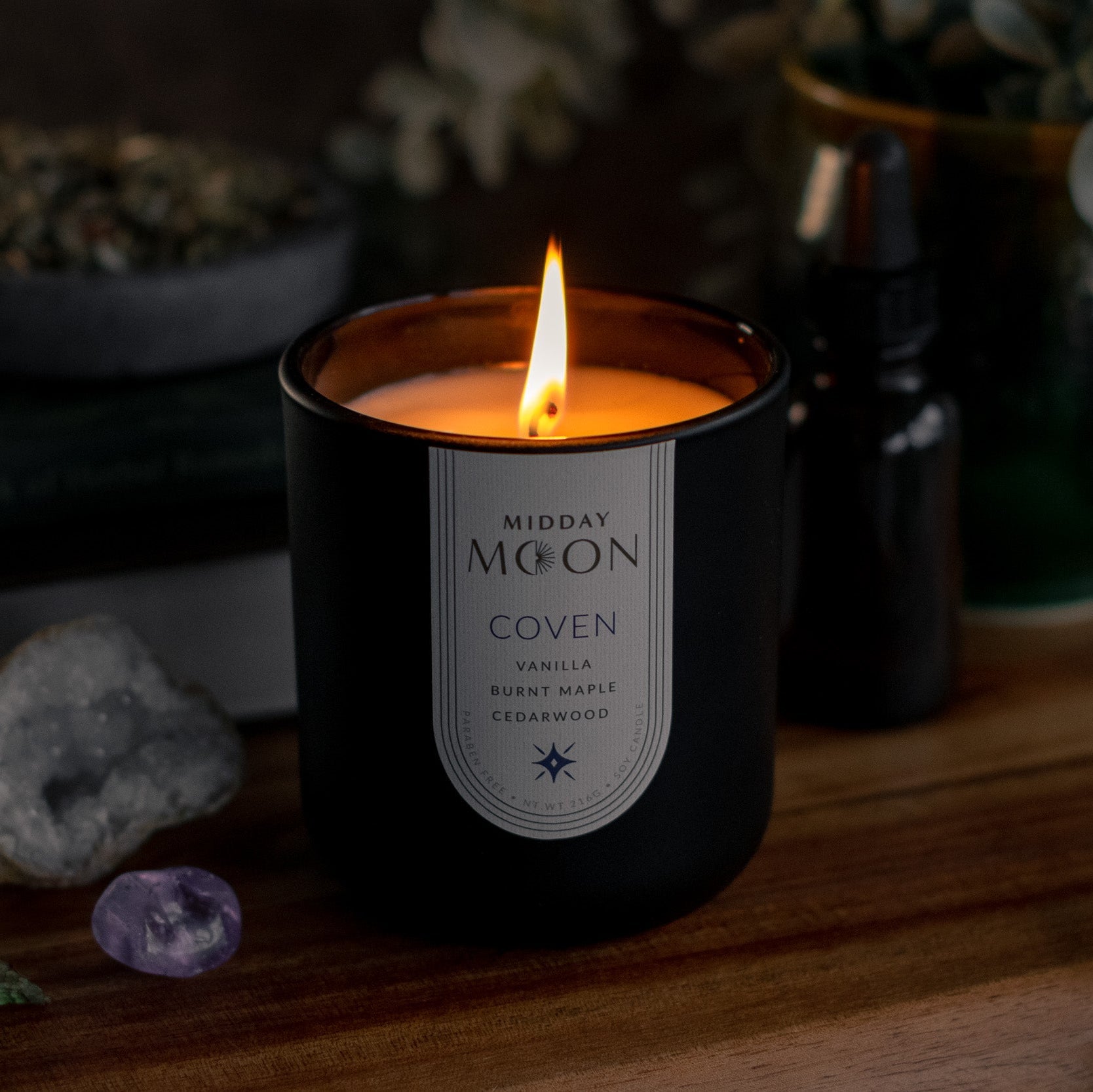 a dark, witchy candle named coven. Smells like vanilla, burnt maple, and cedar wood.